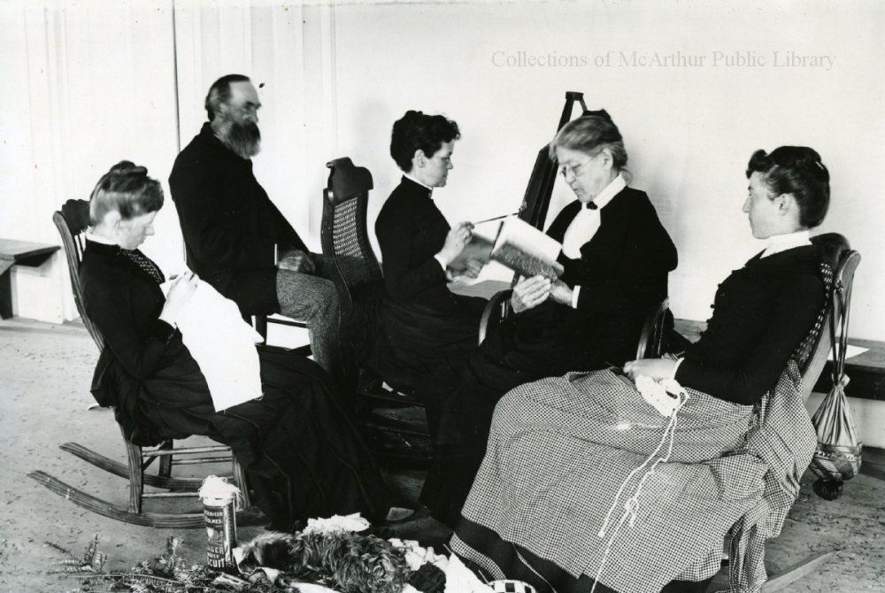 Folks reading, sewing